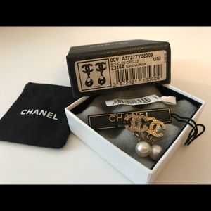 Authentic Chanel CC logo with pearl earrings